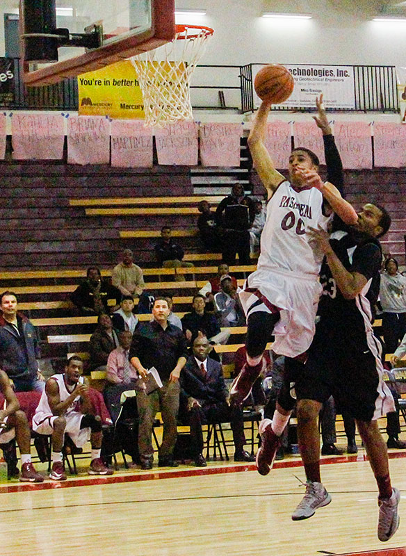 Justin Clay/Courier Freshman forward Bryce Clifton goes up for a slam dunk in PCC's 81-61 win over ECC Compton in the Hutto-Patterson Gymnasium on Feb. 20. The Lancers easily picked up the win in their final home game of the season.