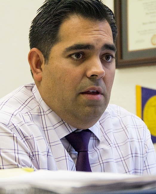 John Novak / Courier Juan Guttierrez, Director of Govermental And Community Relations, in his old office in the C Building on Friday, Sept, 6, 2013. Juan was previously the Director Public Relations.