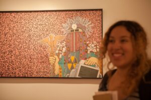 Katja Liebing/Courier Sarit Soto, 21, takes in the exhibition 'The Egun Squad' by artist Mark Steven Greenfield at the Offramp Gallery as part of Pasadena Art Night on Friday, October 9, 2015. The Offramp Gallery was awarded the 'City's Best Home For Local Art' in 2012 by Pasadena Magazine.