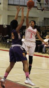 Ahmad Akkaoui/Courier - Sophomore point guard Judith Espinoza drives to the basket and shoots a floater over a defender in Pasadena’s 58-51 win against Los Angeles Trade Technical College on Friday February 5, 2016.