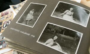 Katja Liebing/Courier Pictures of a young Marlis Hass in a photo album she assembled herself after her move to the US.
