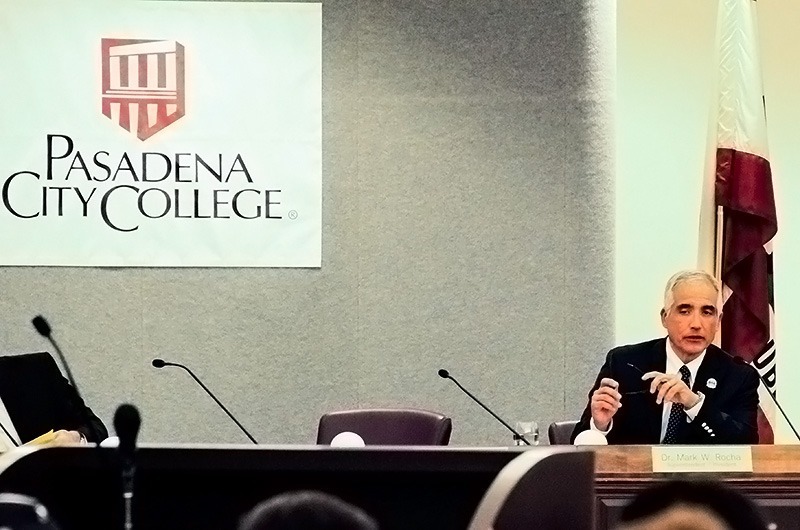 Antonio Gandara / Courier President Mark Rocha delivers a lengthy defense of his administration at the Board of Trustees meeting on Wednesday, Mar. 13.