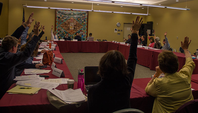 John Novak / Courier Members of the Academic Senate vote on no confidence in President Mark Rocha by raising of their hands in agreement in the Circadian on April, 15.