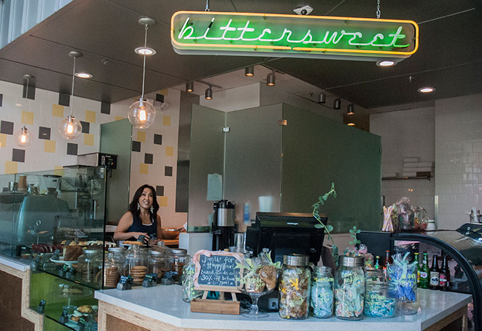 Caitlin KellyThompson / Courier Co-owner, Linda Chen, of Bittersweet Treat welcomes her customers on Wednesday, Sept. 24.