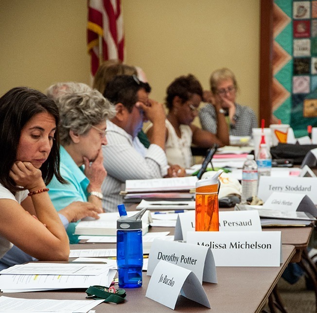 Teresa Mendoza / Courier Faculty members at the Academic Senate.