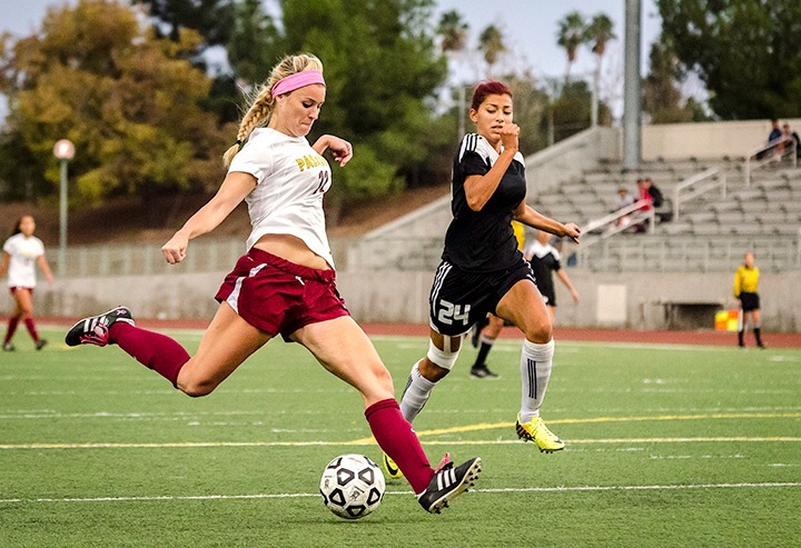 PCC women's soccer Amanda Papac takes a shot at the goal against ECC Compton at Robinson Stadium in the last game of the season, Nov. 15, 2013. PCC defeats ECC Compton 3-0.
