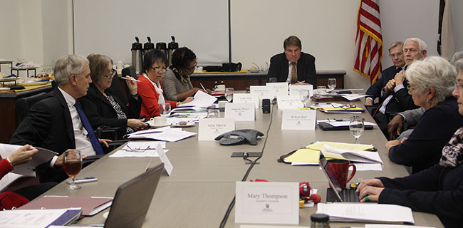 A search firm makes a presentation to the Board of Trustees at a meeting on Tuesday. (Paul Ochoa/Courier)
