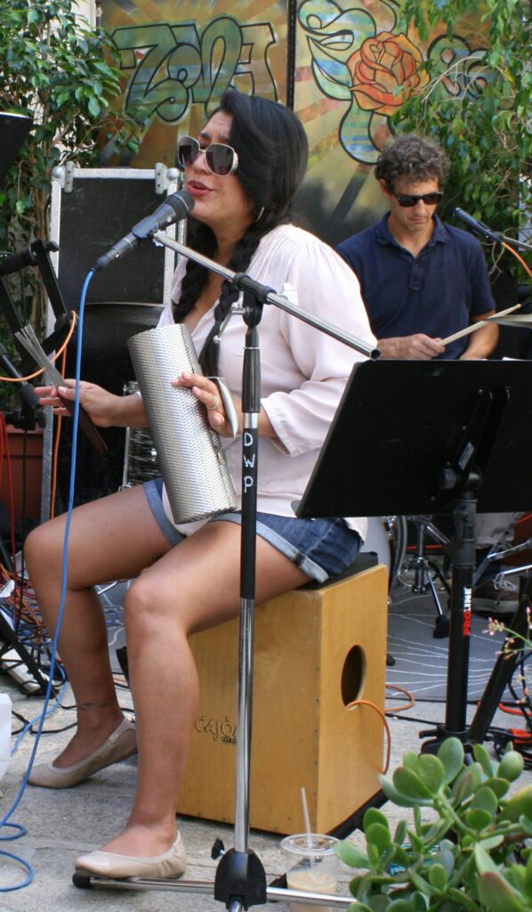 Monique A. LeBleu/Courier Cava and Adam Topol of the band Cava play their “ceviche gumbo” mix of spicy latin-afro-cuban-funk-fusion music in the Zona Rosa Coffee adjacent alley on Sunday, September 13, 2015.